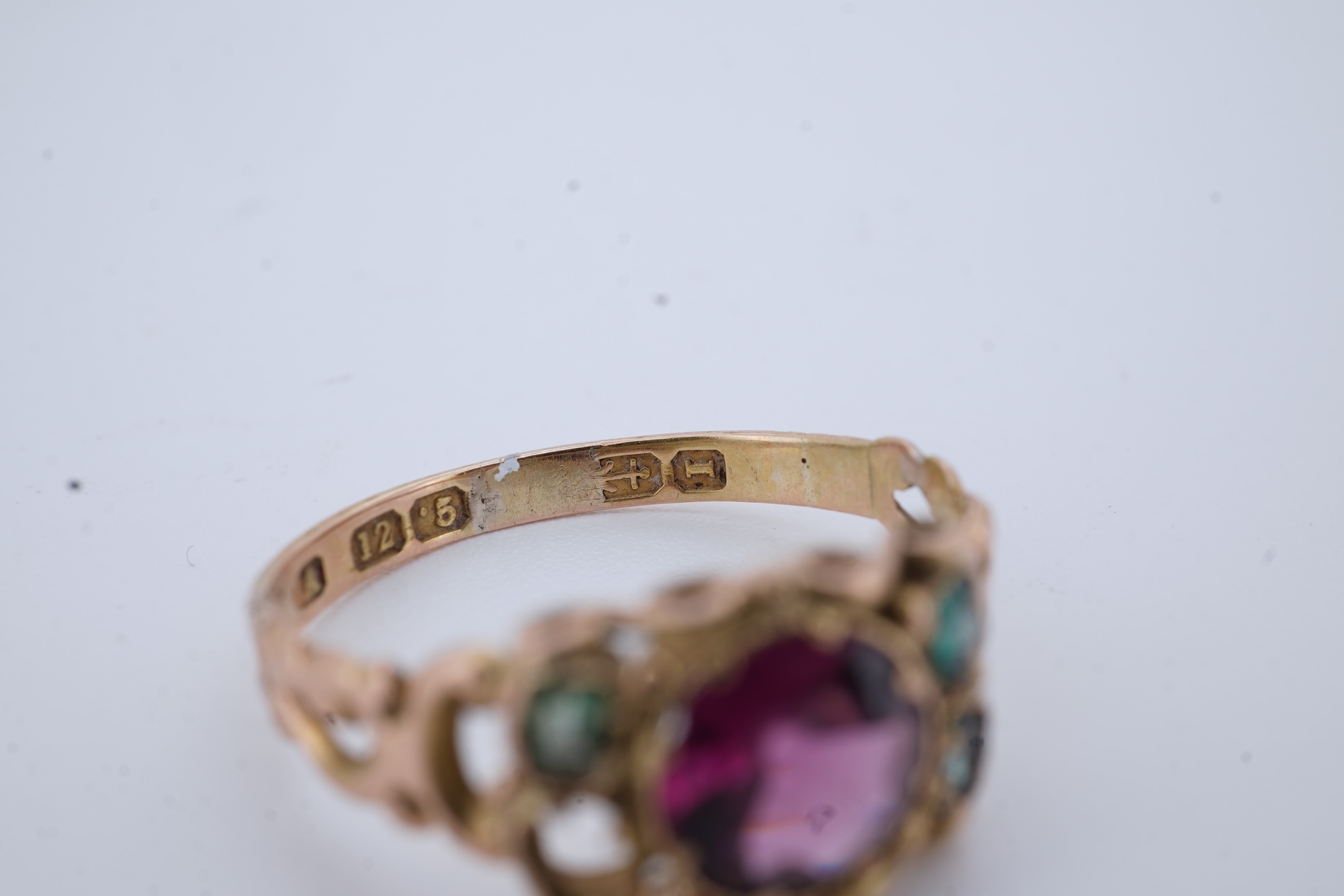 A Victorian garnet and paste ring, circa 1857